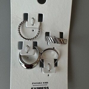4 stackable silver rings from Express Size 8